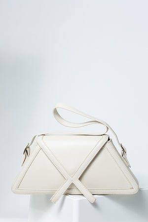 Arizona Triangular Sling Handbag With Criss-Cross Detail In Ivory
