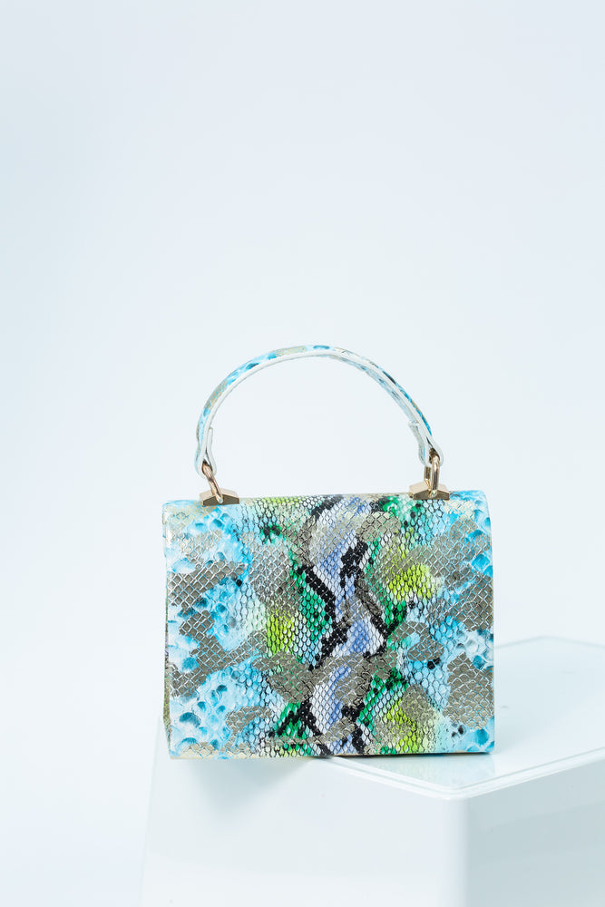 
            
                Load image into Gallery viewer, Ivorian Snakeskin Print Bag In Aqua
            
        
